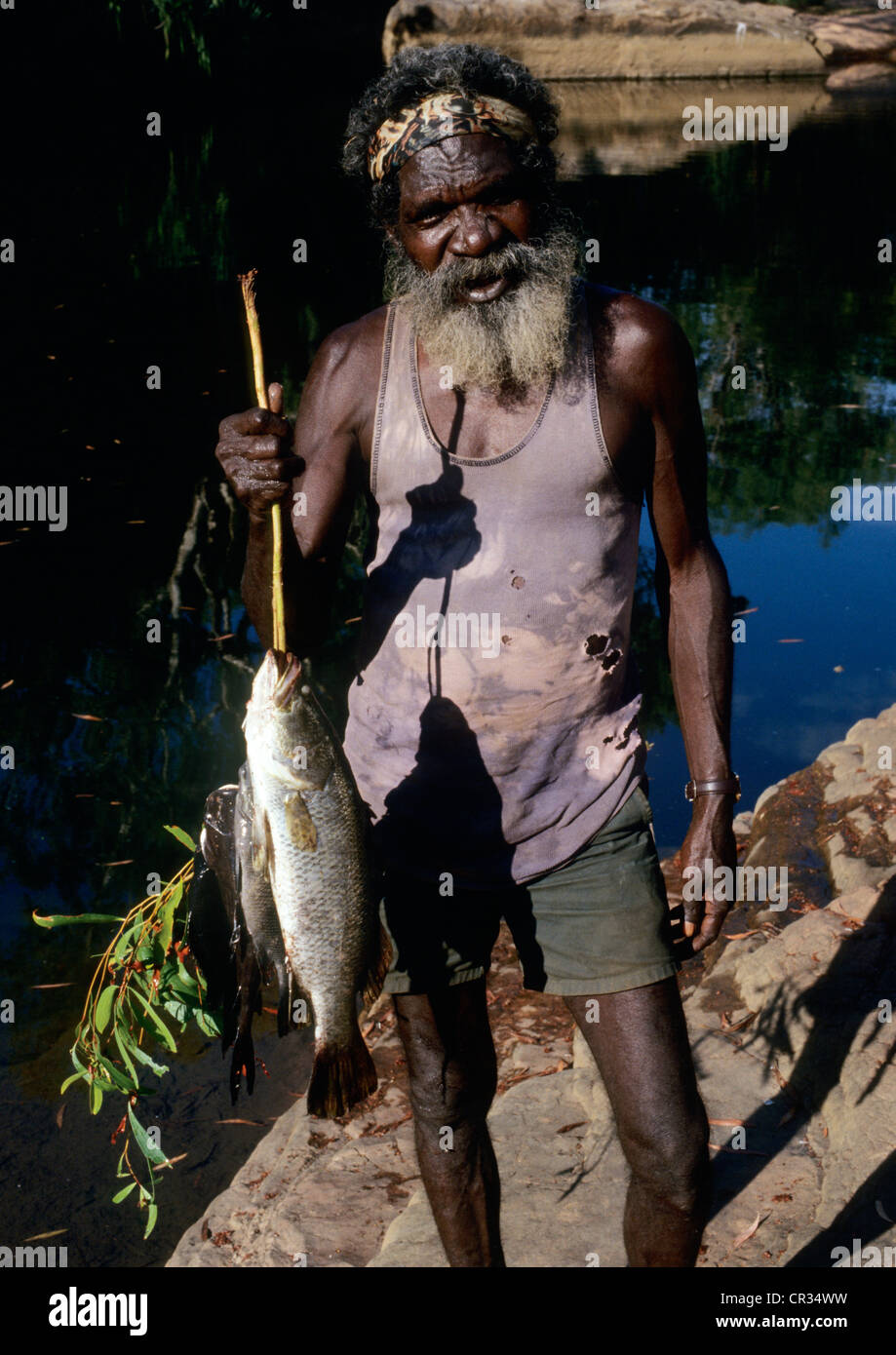 Australia, Northern Territory, Arnhem Land, Native Australian showing a Baramundi, river fish Stock Photo