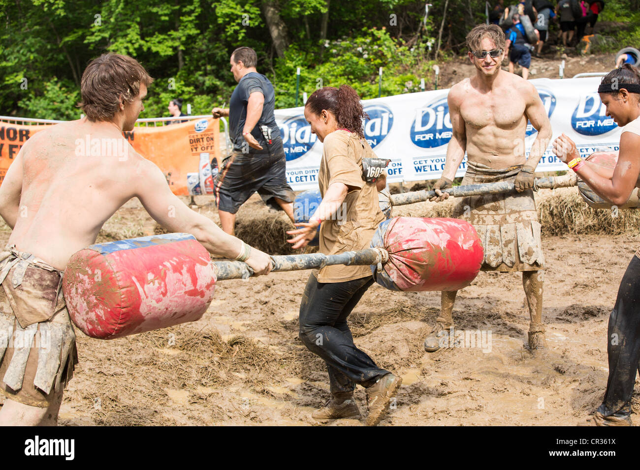 Participants of challenging sprint obstacle trail race, Spartan Race in Tuxedo New York, running