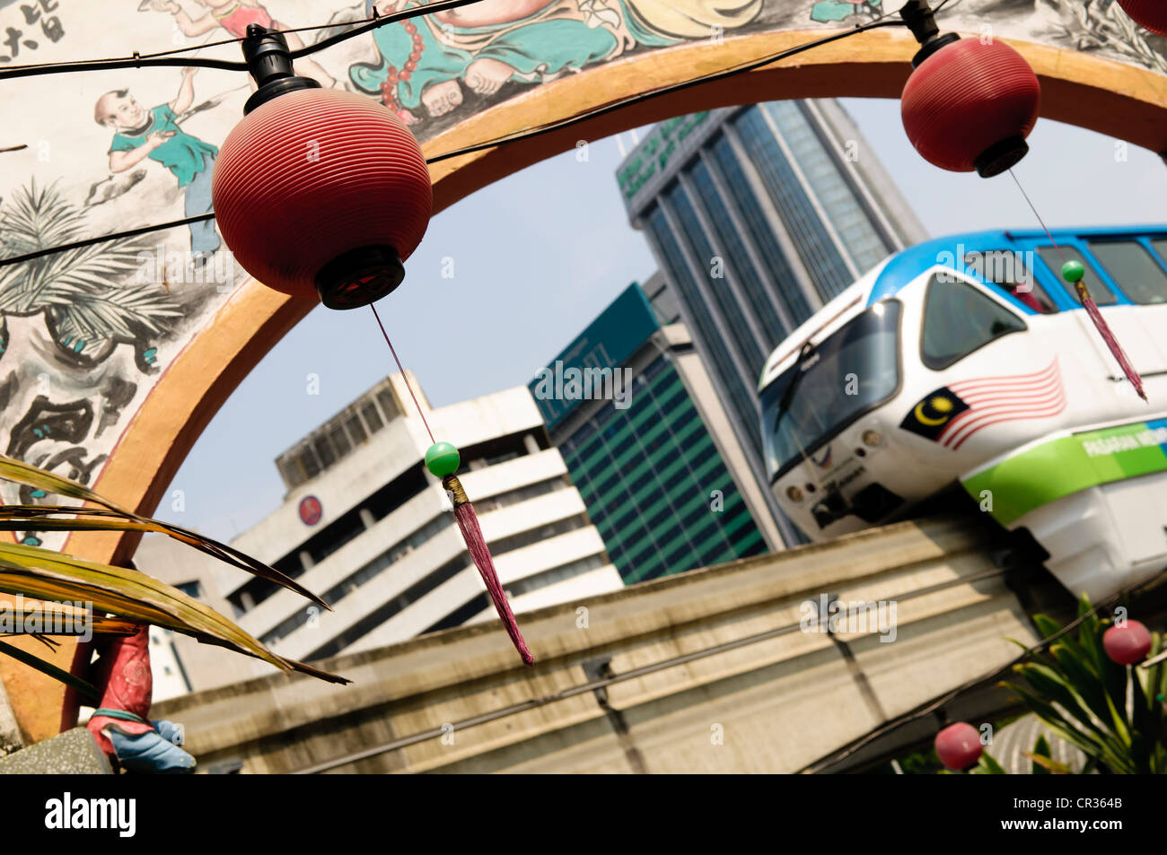 Lanterns and monorail at the entrance of Koon Yam Guanyin Temple, Chinatown, Kuala Lumpur, Malaysia, Southeast Asia Stock Photo