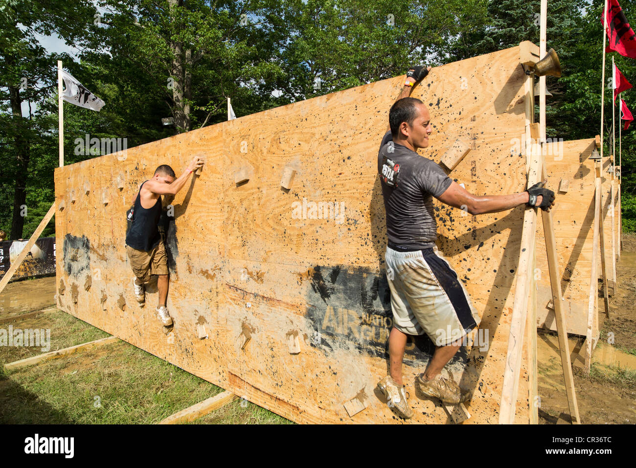 Participants of challenging sprint obstacle trail race, Spartan Race in Tuxedo New York, running