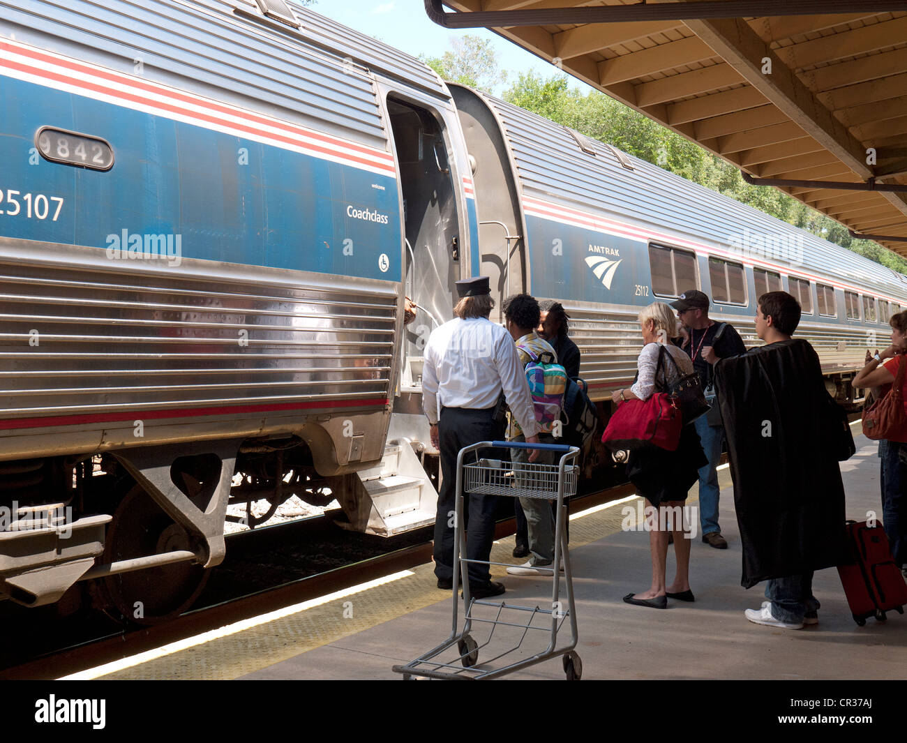 Passengers boarding an Amtrak train at DeLand Florida USA Stock Photo Alamy