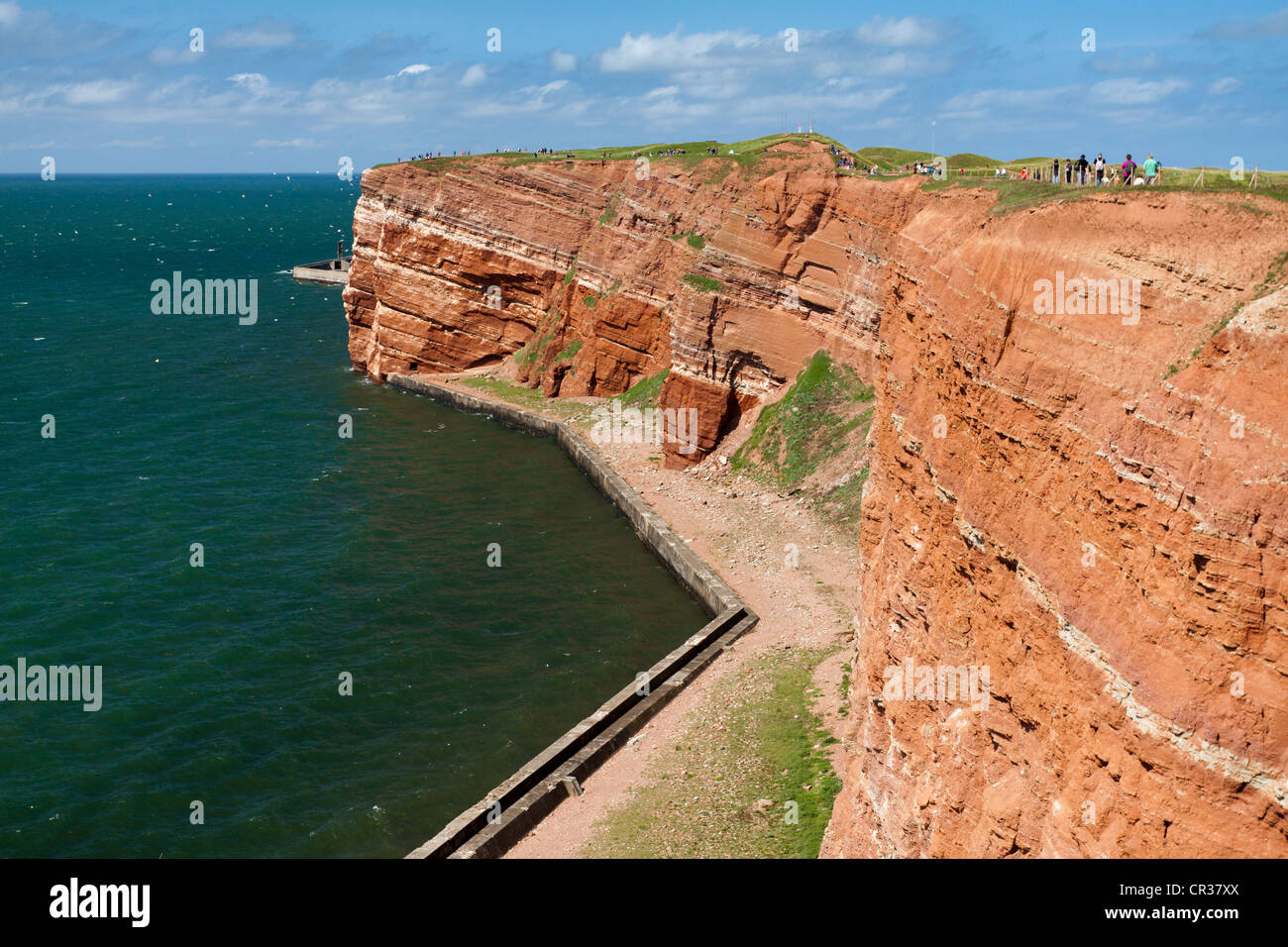 The prominent steep red sandstone cliffs of Heligoland, Helgoland, Schleswig-Holstein, Germany, Europe Stock Photo