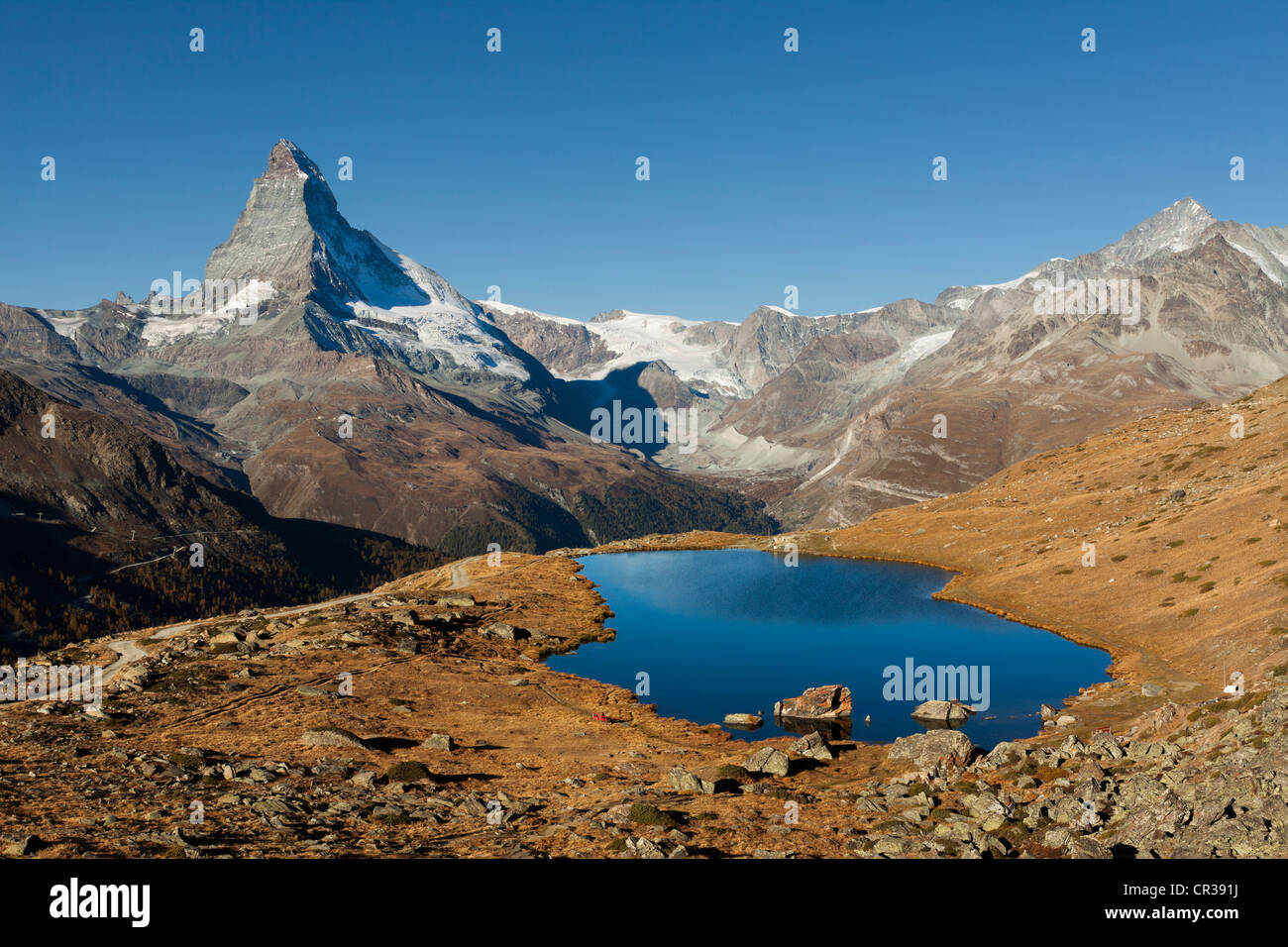 Mt Matterhorn, 4478 m, and Stellisee Lake, from Fluhalp, Zermatt, Canton Valais, Switzerland, Europe, PublicGround Stock Photo