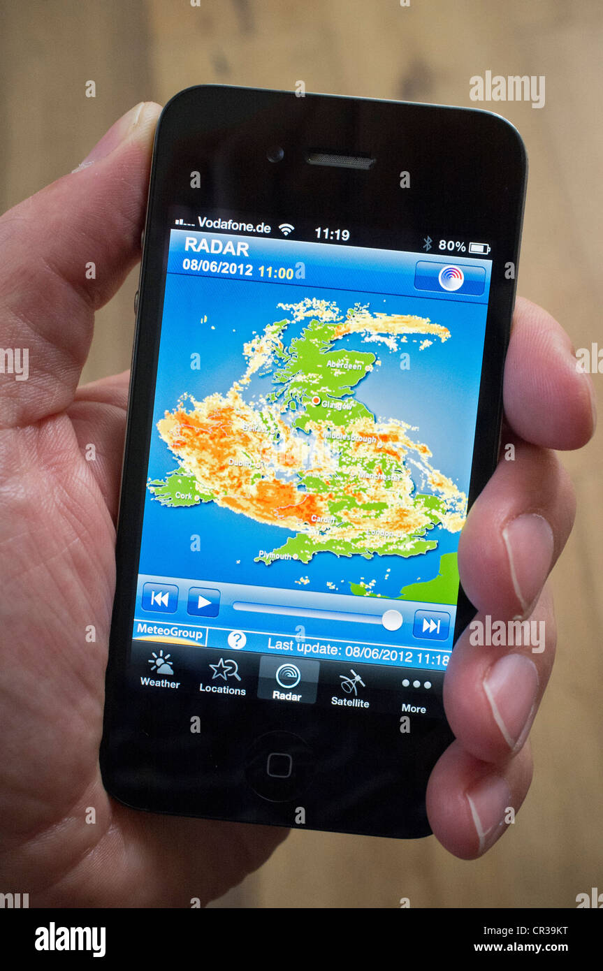 Severe storm over the United Kingdom shown on radar image using weather forecast App on iPhone smartphone Stock Photo