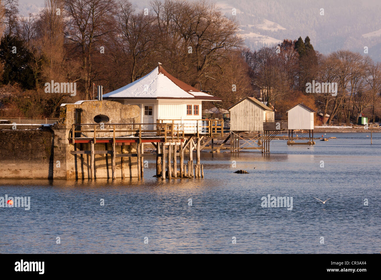 Beach huts on Lake Constance near Wasserburg in winter, in the evening light, district of Lindau, Bavaria, Germany, Europe Stock Photo