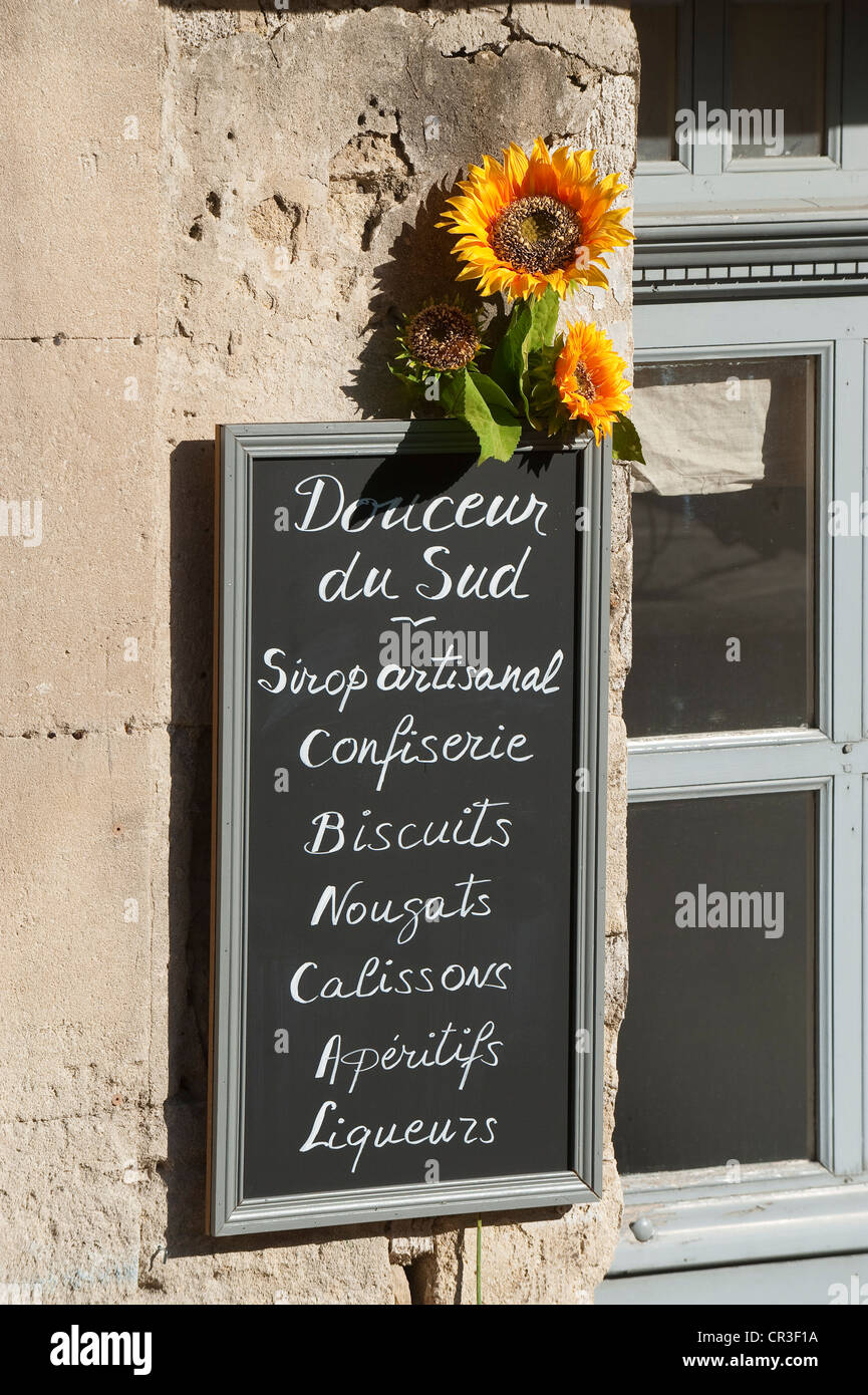France, Vaucluse, Luberon, Gordes, labelled Les Plus Beaux Villages de France, shop sign in historical centre Stock Photo