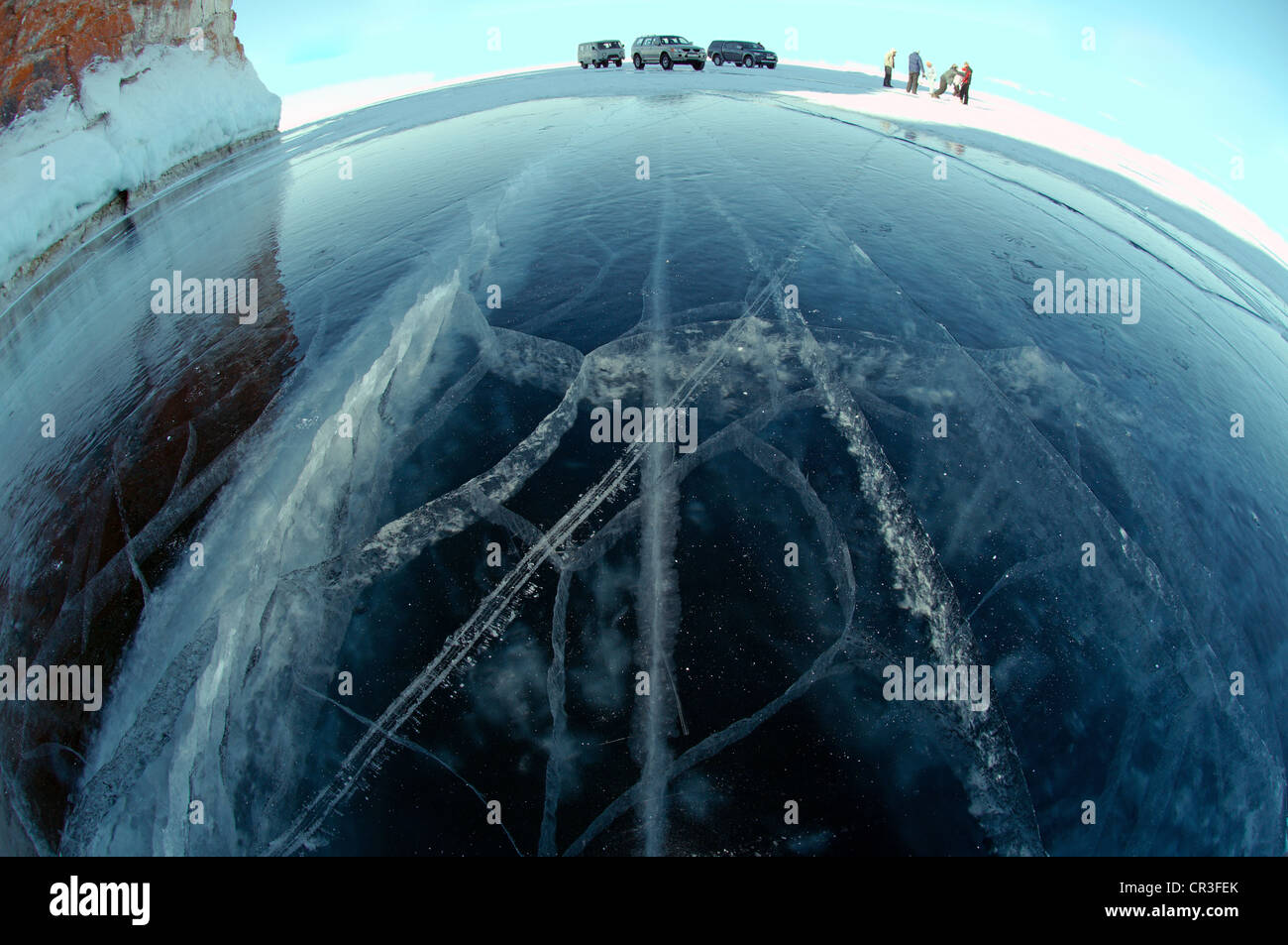 Cars and people on frozen Lake Baikal, island Olkhon, Lake Baikal, Siberia, Russia, Eurasia Stock Photo