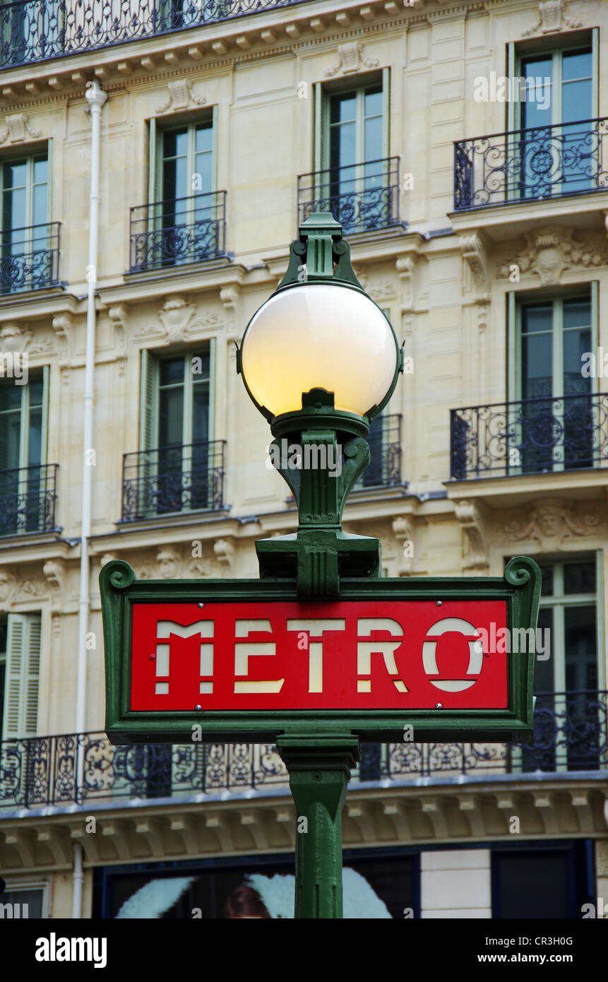 Art Nouveau metro sign with lamp in Paris, France, Europe Stock Photo