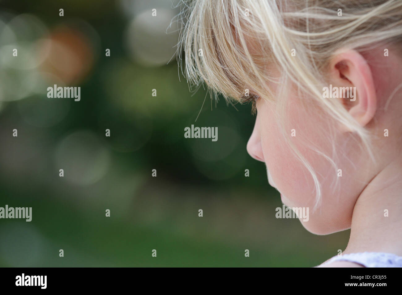 Profile of a pretty young girl with copy space Stock Photo - Alamy