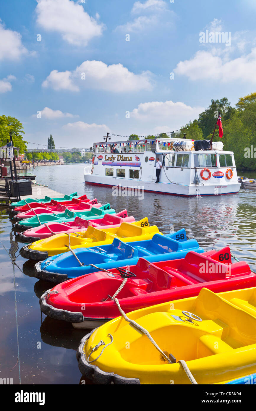 Pedalos and a River cruise trip boat on the River Dee Chester Cheshire England UK GB EU Europe Stock Photo