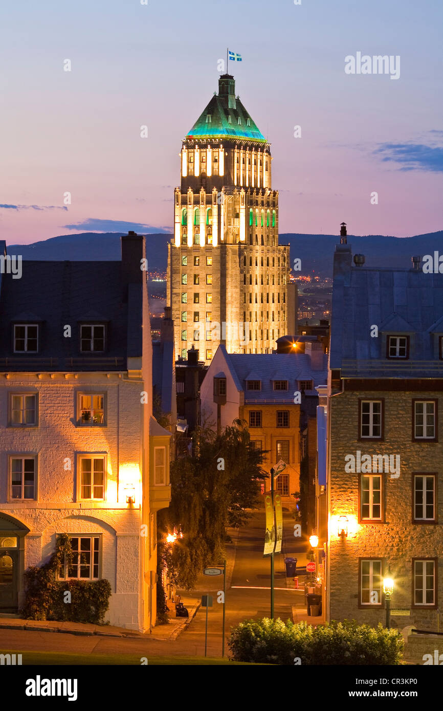 Canada, Quebec Province, Quebec City, Old Town listed World Heritage by UNESCO, Price Building in the background by night Stock Photo