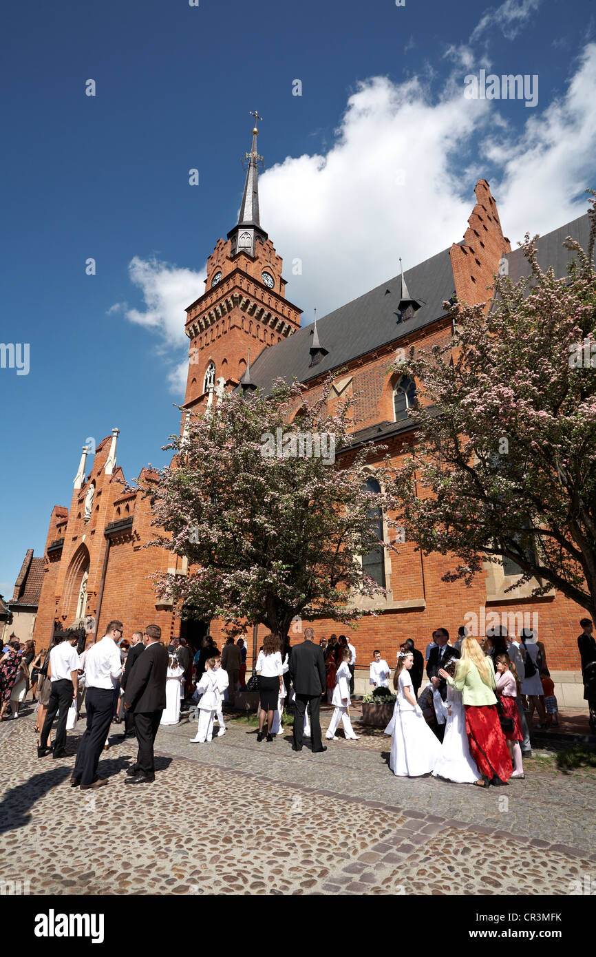 Poland Tarnow Cathedral of Nativity of Virgin Mary. Parents and Children waiting to enter for Ist communion Stock Photo