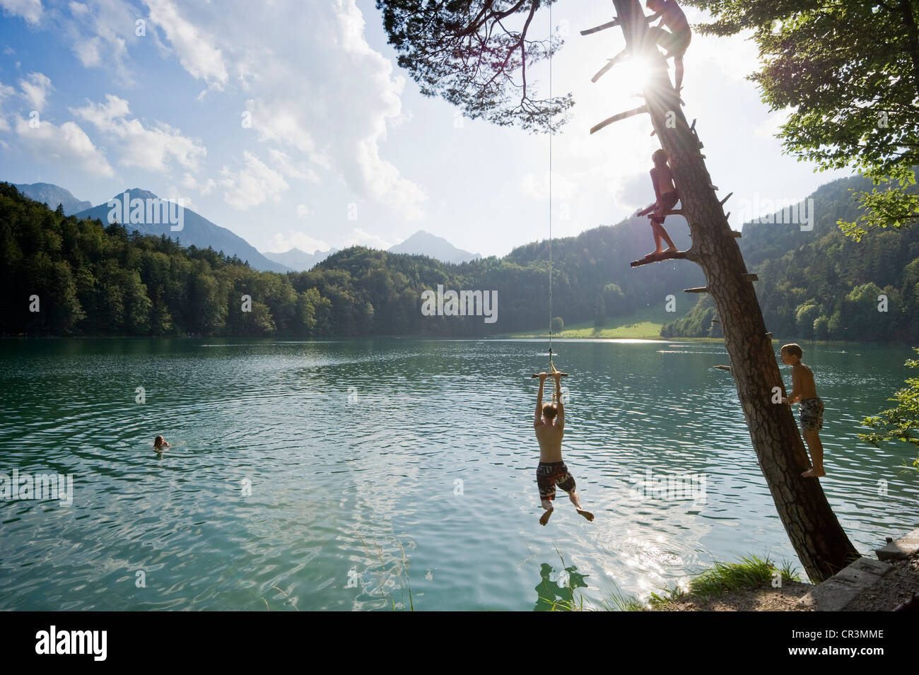 Children having fun on Lake Alatsee near Fuessen, Allgaeu region, Bavaria, Germany, Europe Stock Photo