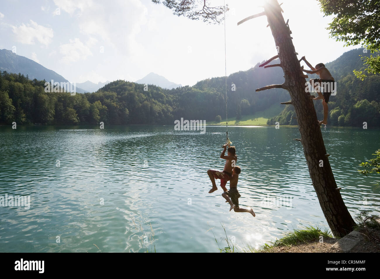 Children having fun on Lake Alatsee near Fuessen, Allgaeu region, Bavaria, Germany, Europe Stock Photo