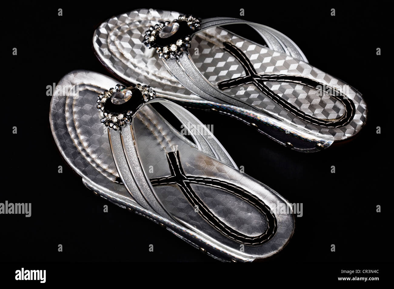 Fancy dressy black and silver Flip-flops Stock Photo