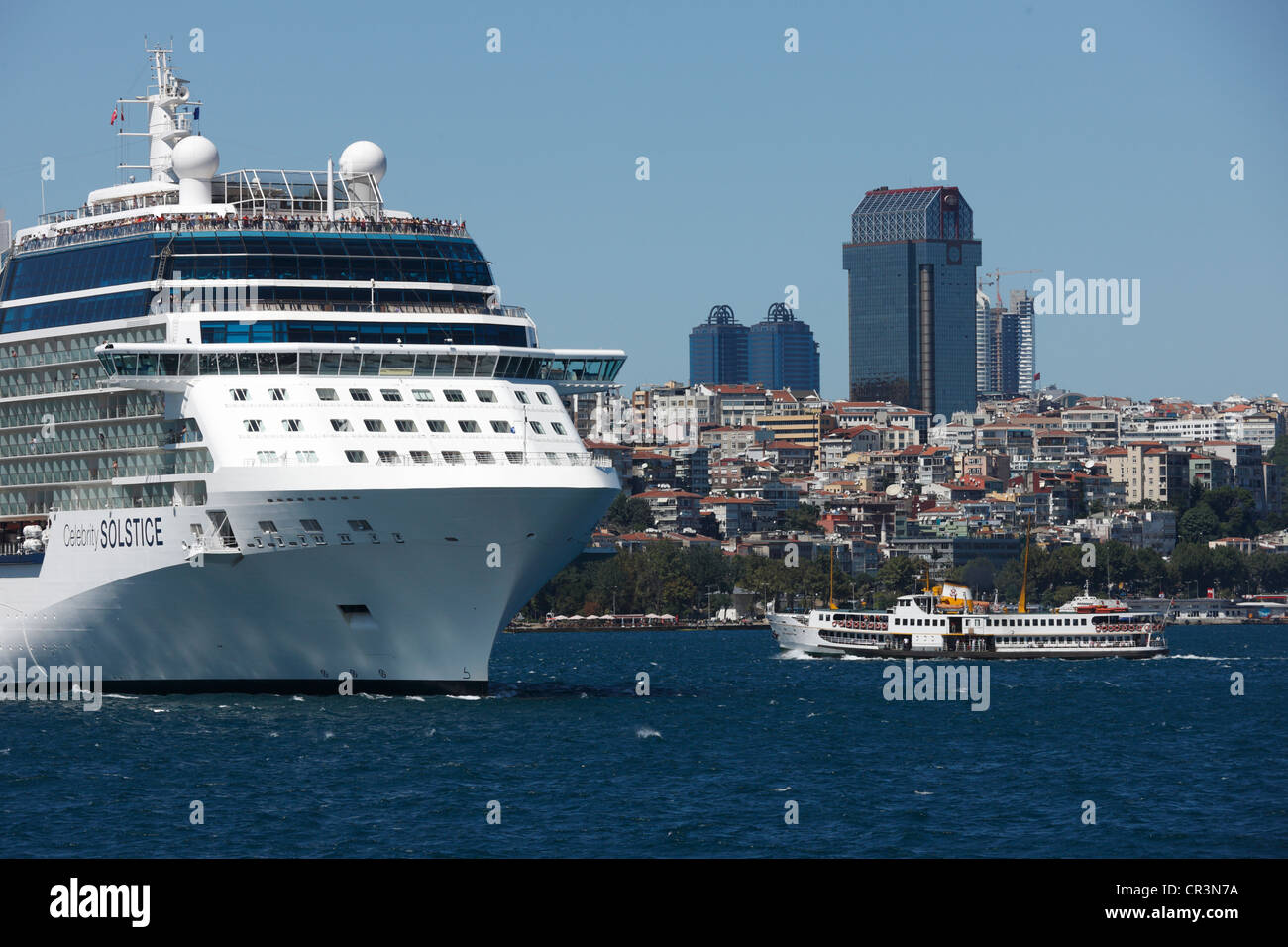 Turkey, Istanbul, the Golden Horn, cruise boats and Ritz-Carlton Tower Stock Photo