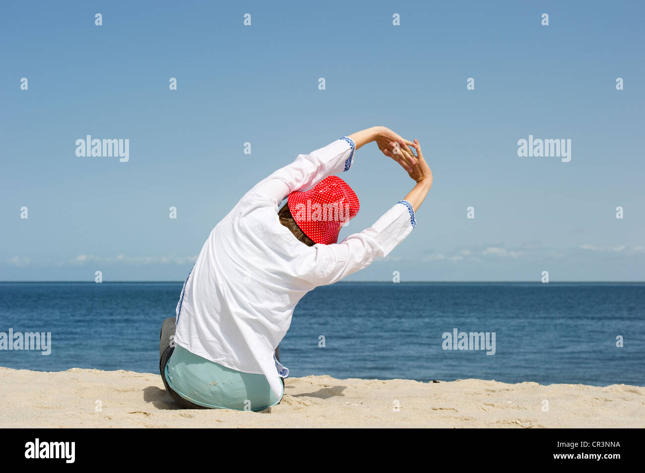 Wearing beach hat hi-res stock photography and images - Alamy