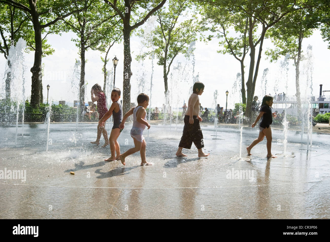 Children playing in the fountain, Battery Park, Manhattan, New York, USA, America Stock Photo