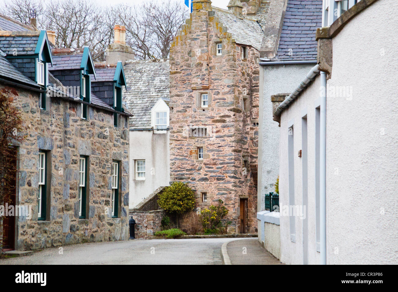 Fordyce Castle is the tall stone building at the end of East Church Street , Fordyce, Scotland. Stock Photo