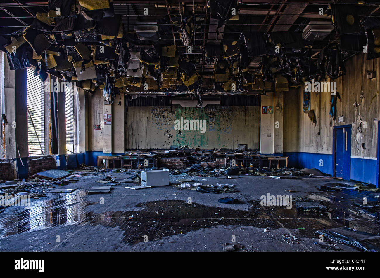The main assembly hall of a school building is badly damaged by fire Stock Photo