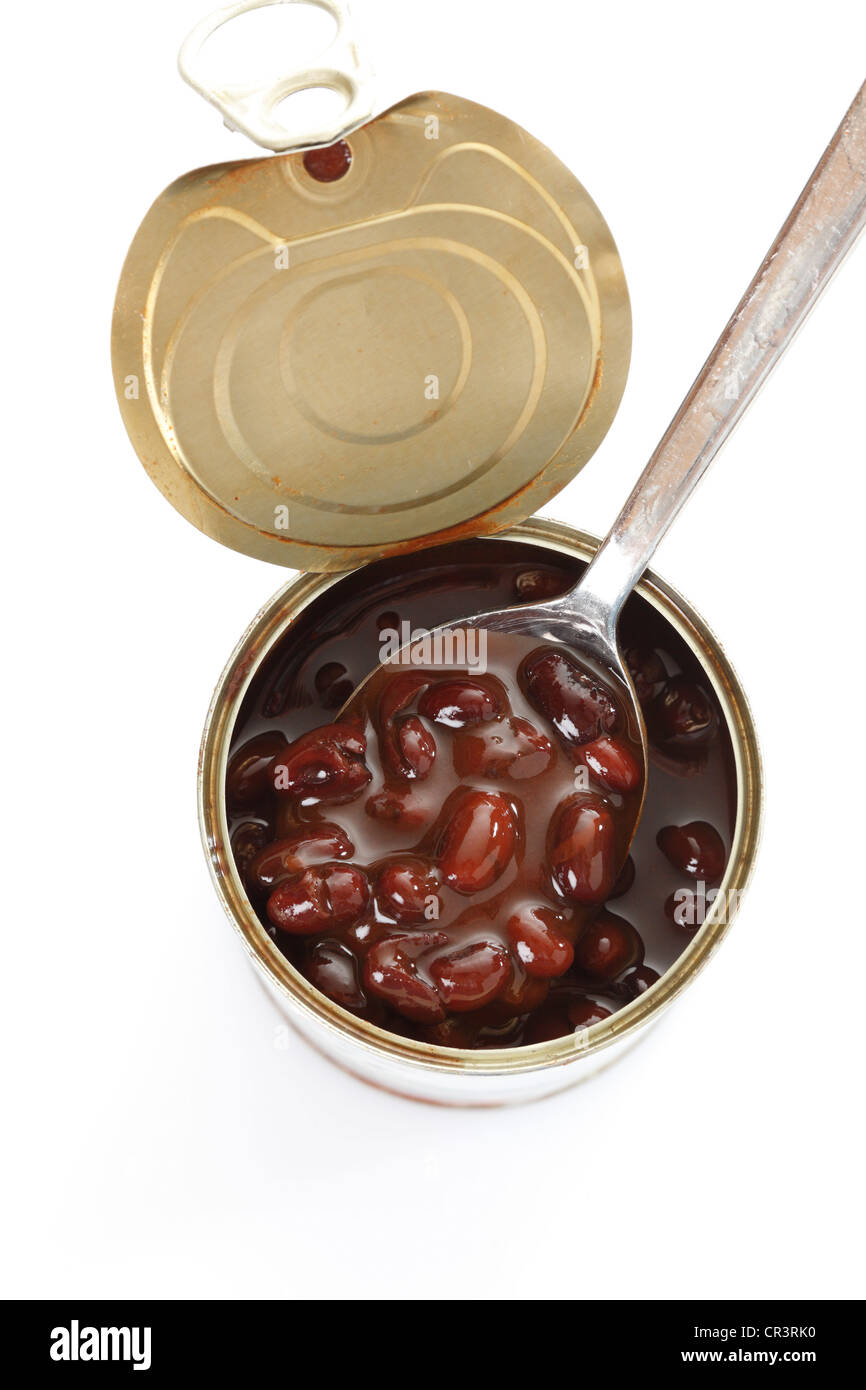 Tin can, opened can of black beans and spoon Stock Photo Alamy