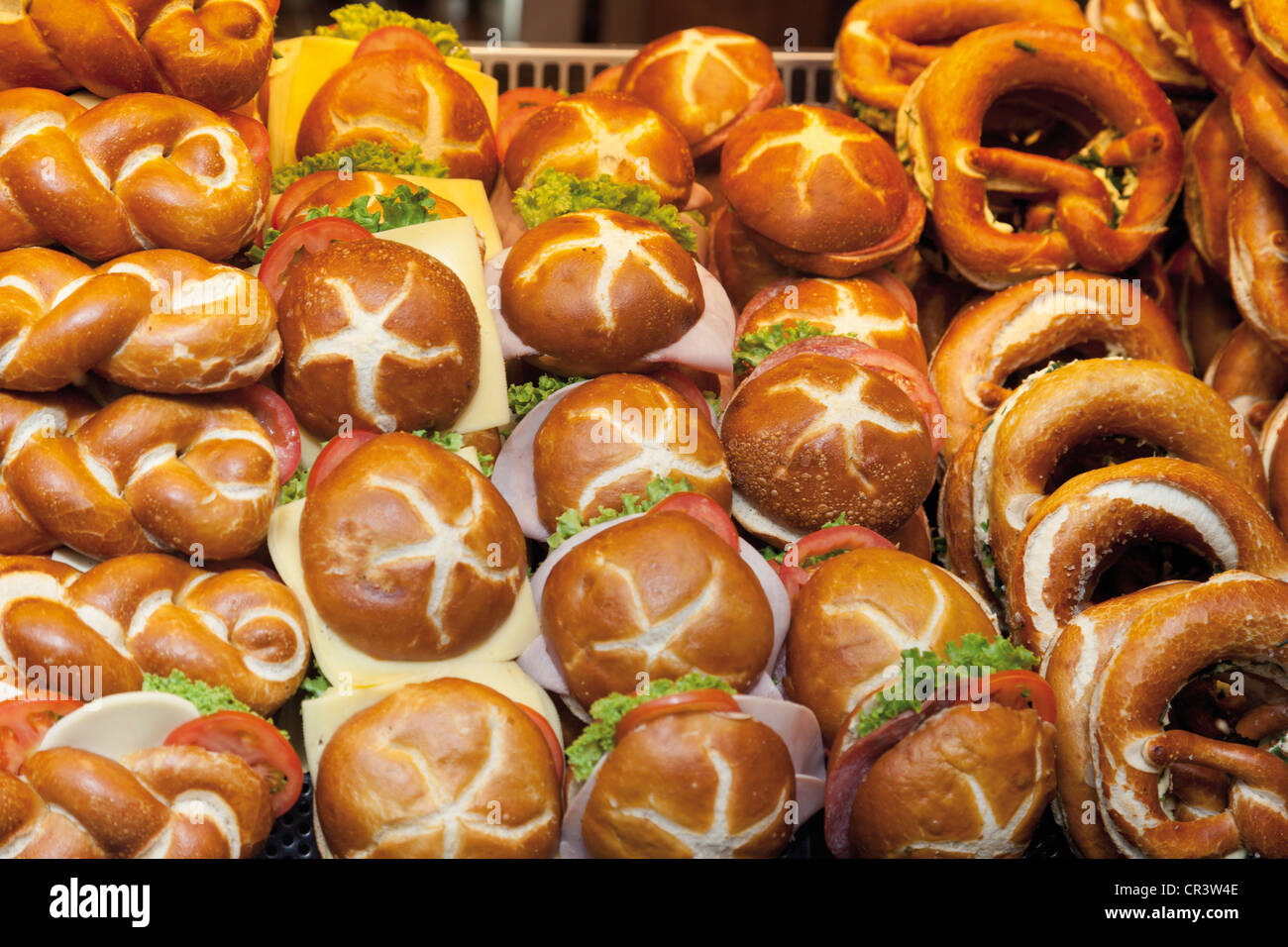 Various pretzel rolls and pretzels in a window display Stock Photo Alamy