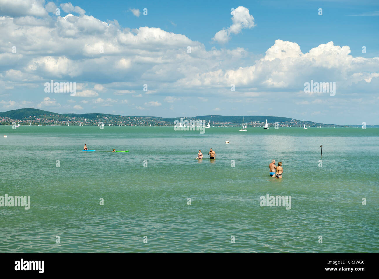 Holiday makers enjoying themselves in the waters of Lake Balaton at Tihany in Hungary. Stock Photo