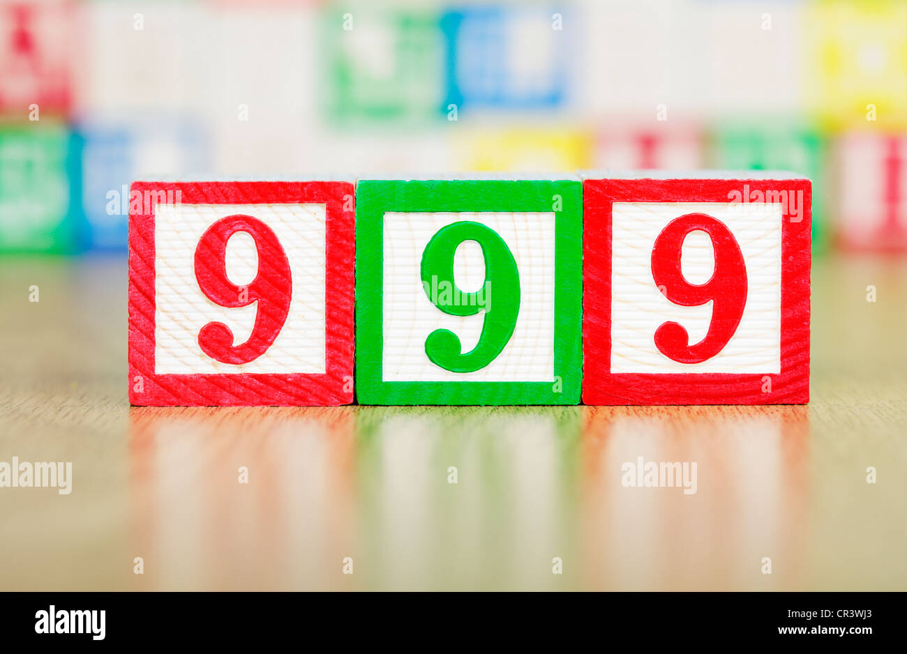 Emergency Number 999 in Child's Building Blocks Stock Photo