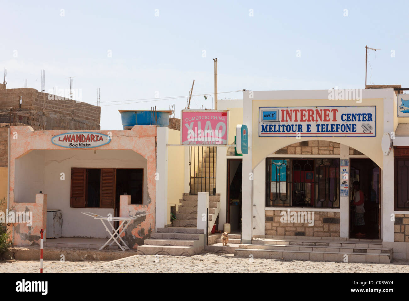 Internet shop and launderette (Lavaria) in the town centre of Sal Rei, Boa Vista, Cape Verde Islands. Stock Photo