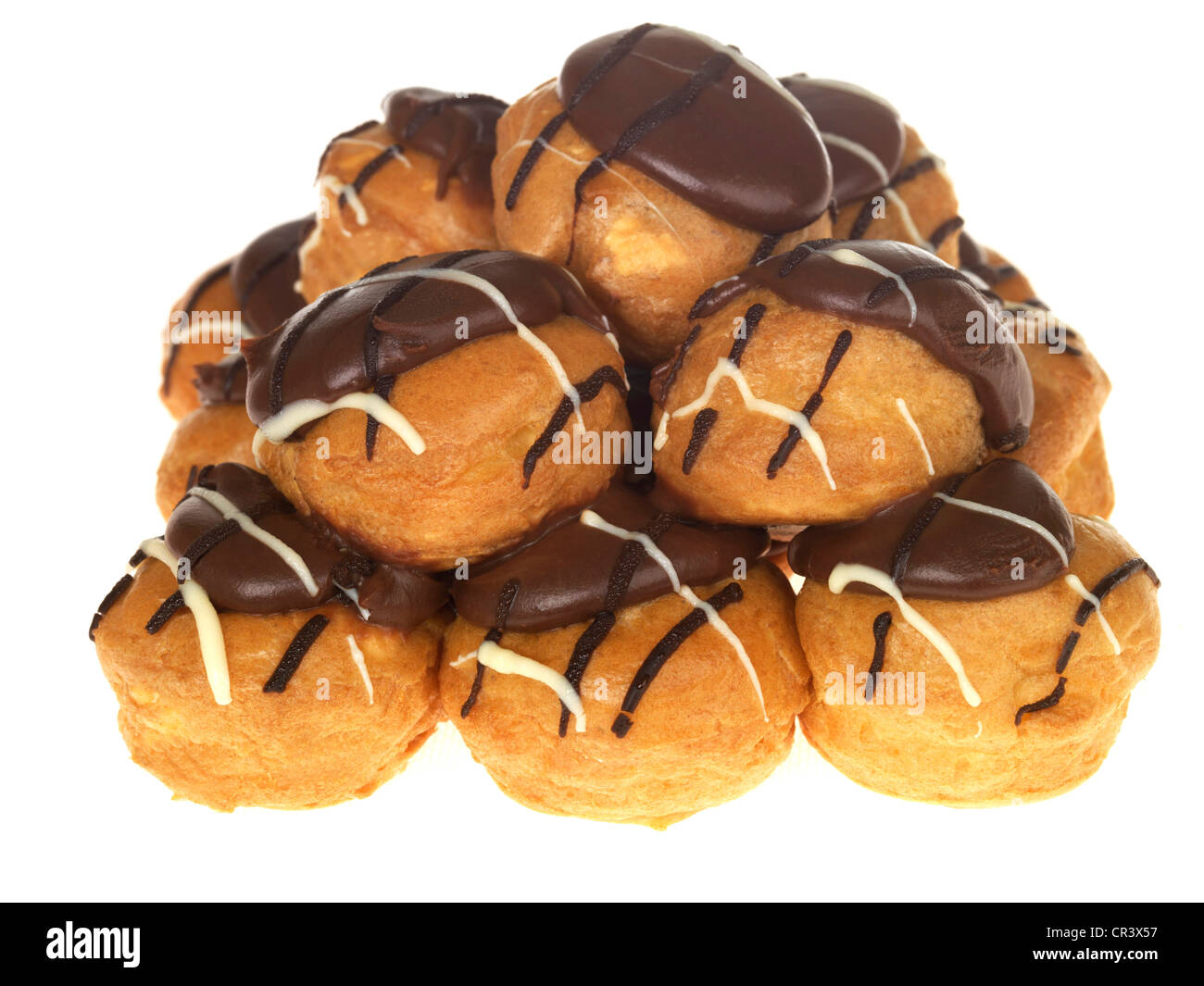 Delicious Luxury Baked Individual Chocolate Profiteroles Dessert, Isolated Against White Background, With Clipping Path And No People Stock Photo
