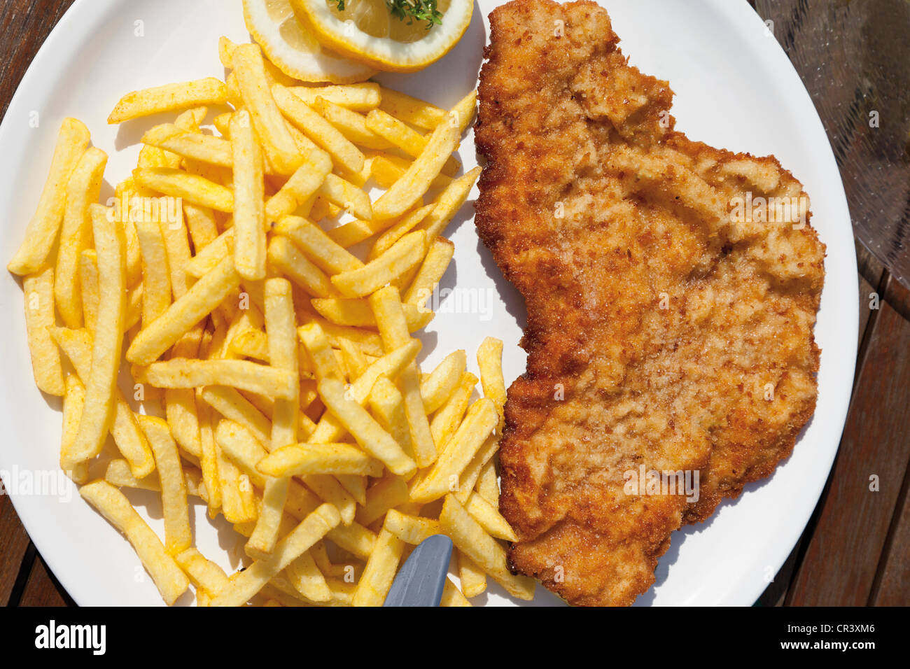 Wiener Schnitzel with French fries Stock Photo