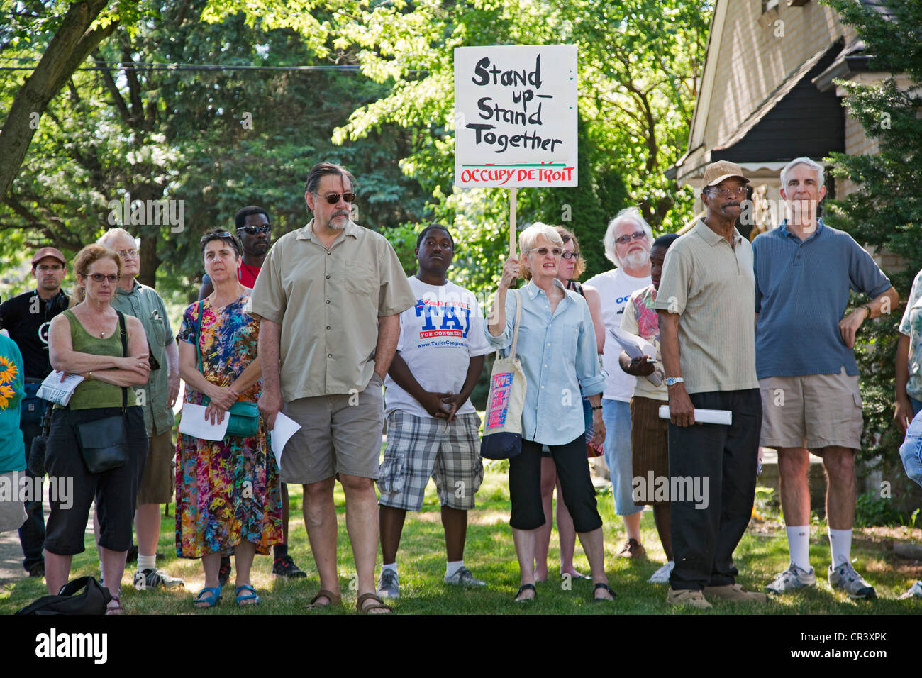 Neighbors rally stop stop home foreclosure Stock Photo