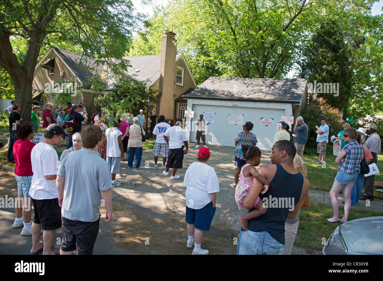 Neighbors rally stop stop home foreclosure Stock Photo