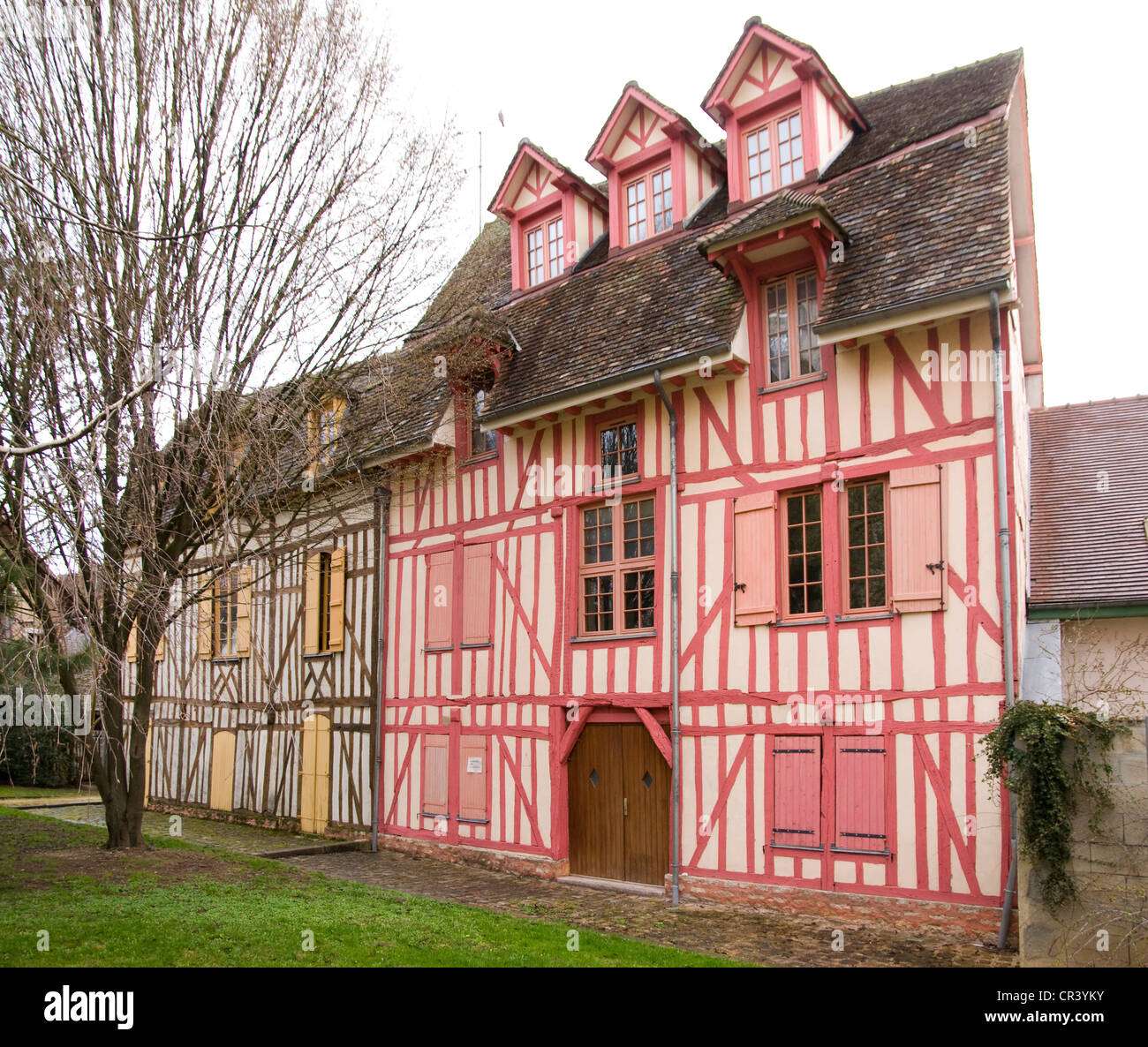 Ancient medieval half timbered wooden framed houses near the cathedral in Troyes France Stock Photo