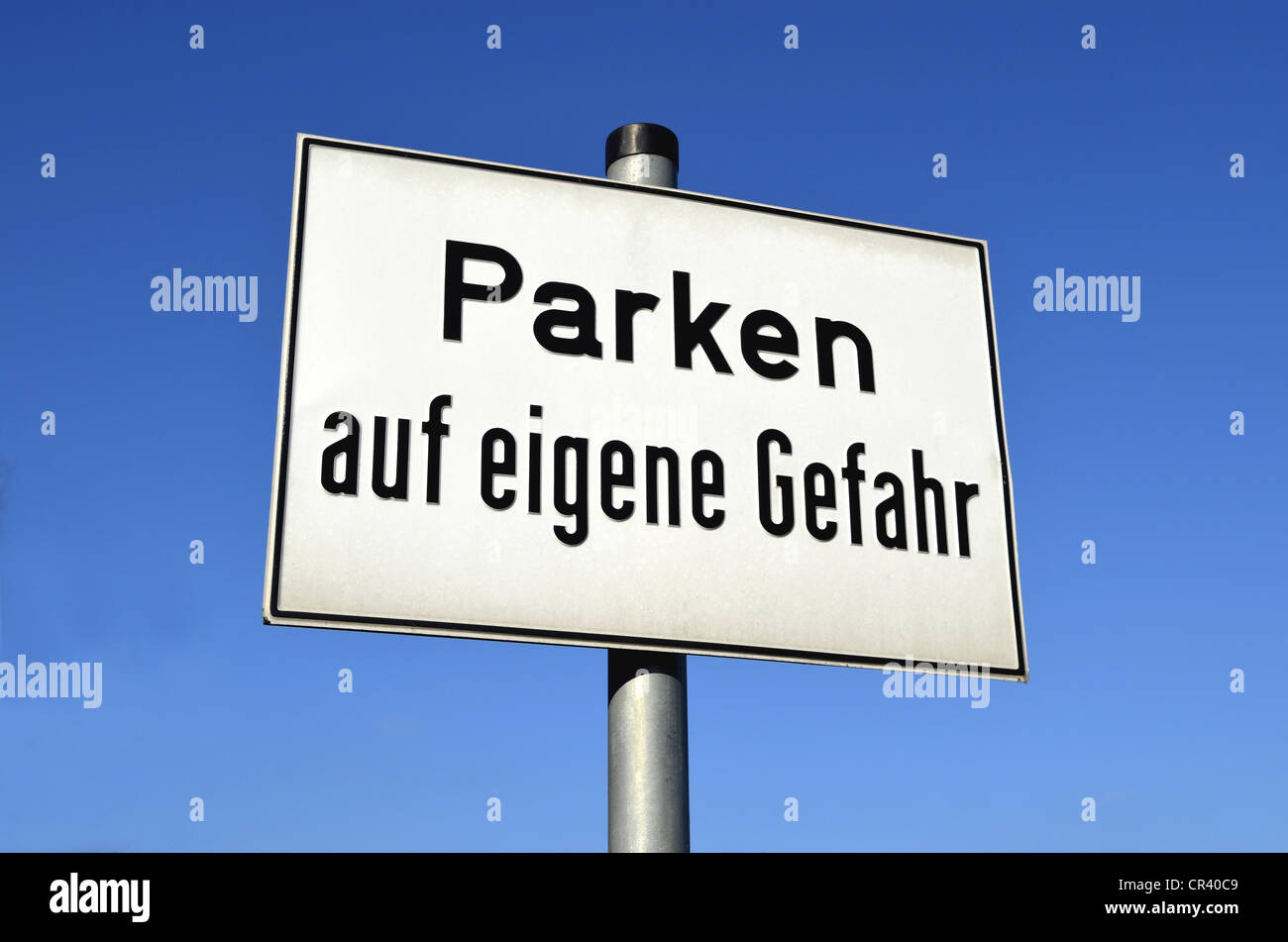 'Parken auf eigene Gefahr', German for 'parking at your own risk', Germany, Europe, PublicGround Stock Photo