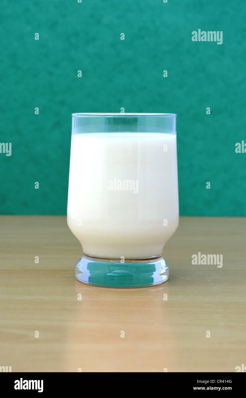 Drinking glass with fresh whole milk Stock Photo
