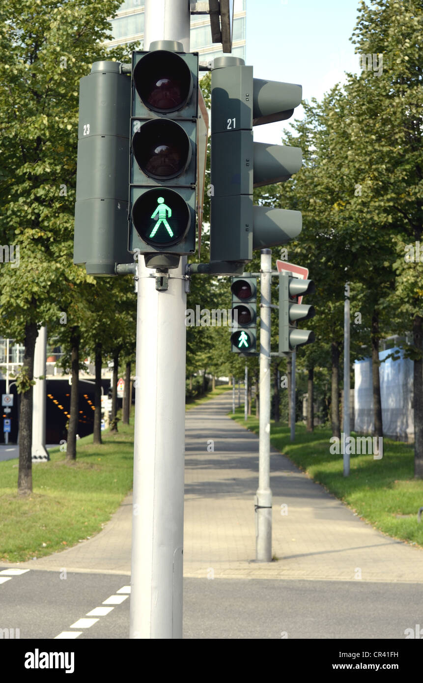 Green pedestrian traffic lights, Voelklinger Strasse street crossing, Duesseldorf, North Rhine-Westphalia, Germany, Europe Stock Photo