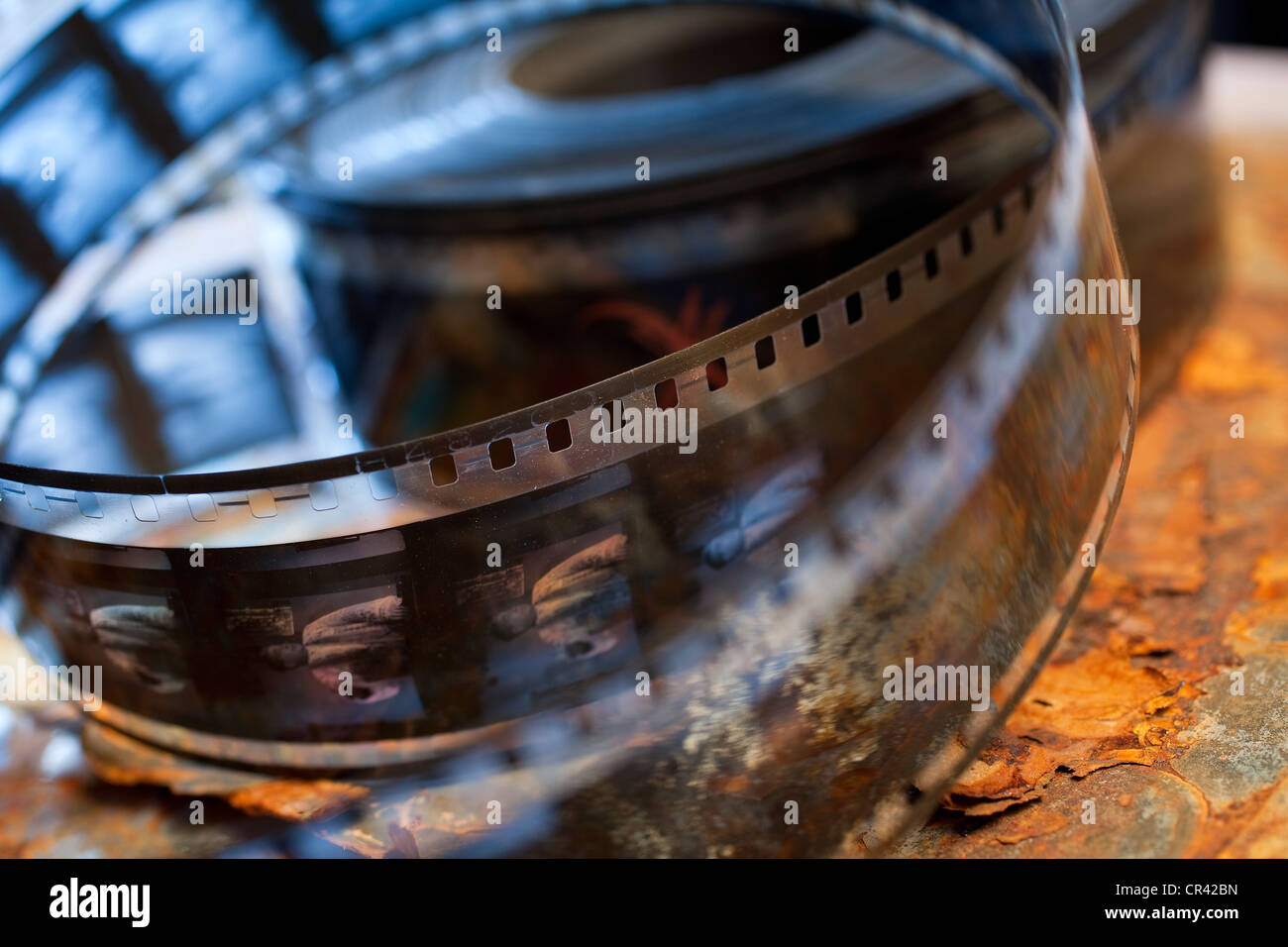 France, Paris, Lobster Films Workshop, old films restorer, close up on film Stock Photo