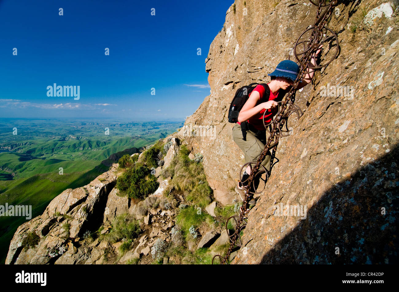 Hiker climbing an iron ladder, Sentinel Hiking Trail, Drakensberg Mountains, KwaZulu-Natal, South Africa, Africa Stock Photo