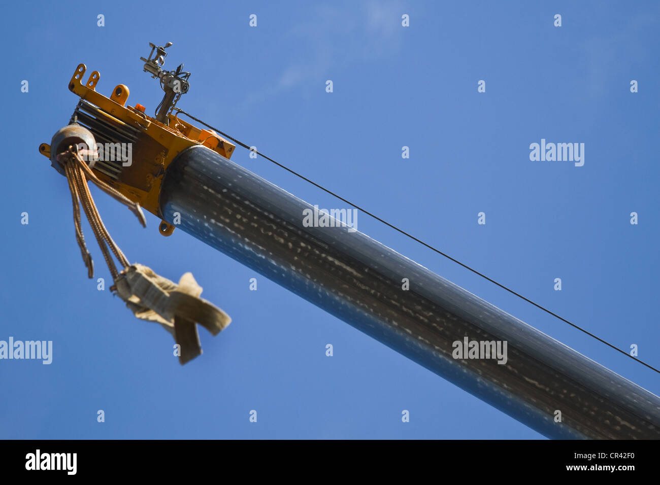 Telescopic crane arm seen from below. Stock Photo