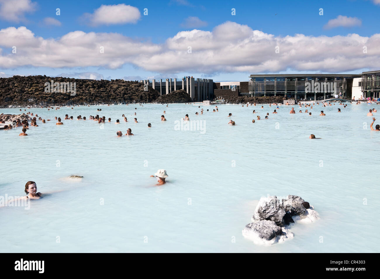 Iceland, Sudurnes region, Grindavik, the Blue Lagoon with the geothermical factory in the background Stock Photo