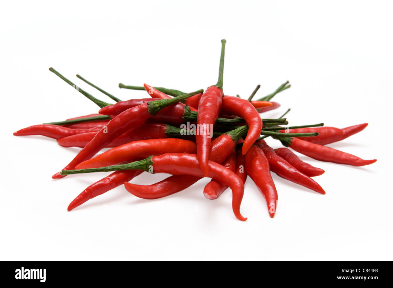 red chili peppers isolated on a white background Stock Photo - Alamy