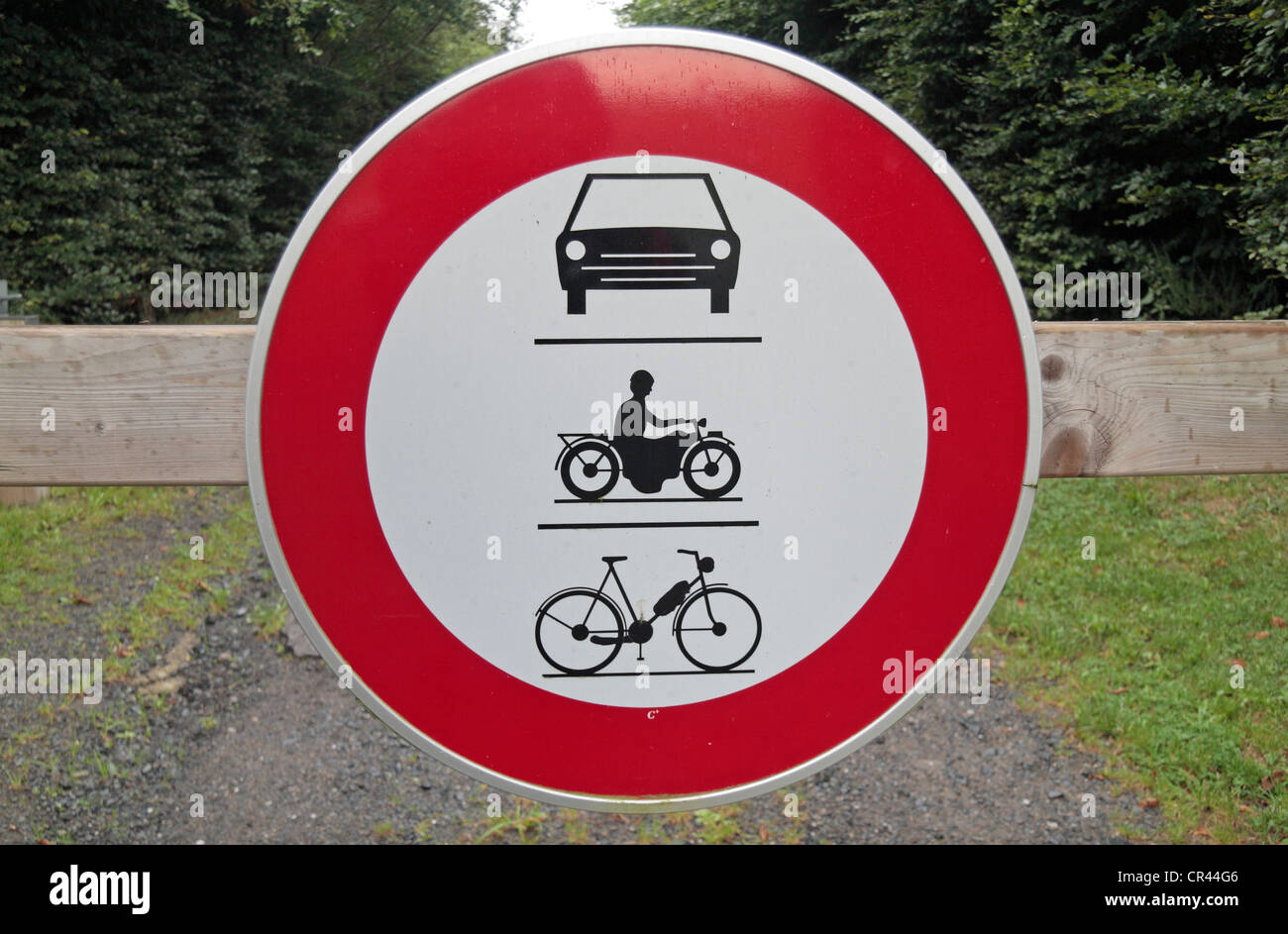 A sign banning cars, motorcycles and cycles from the Bois de la Paix (the Wood of Peace), near Bastogne, Walloon, Belgium. Stock Photo
