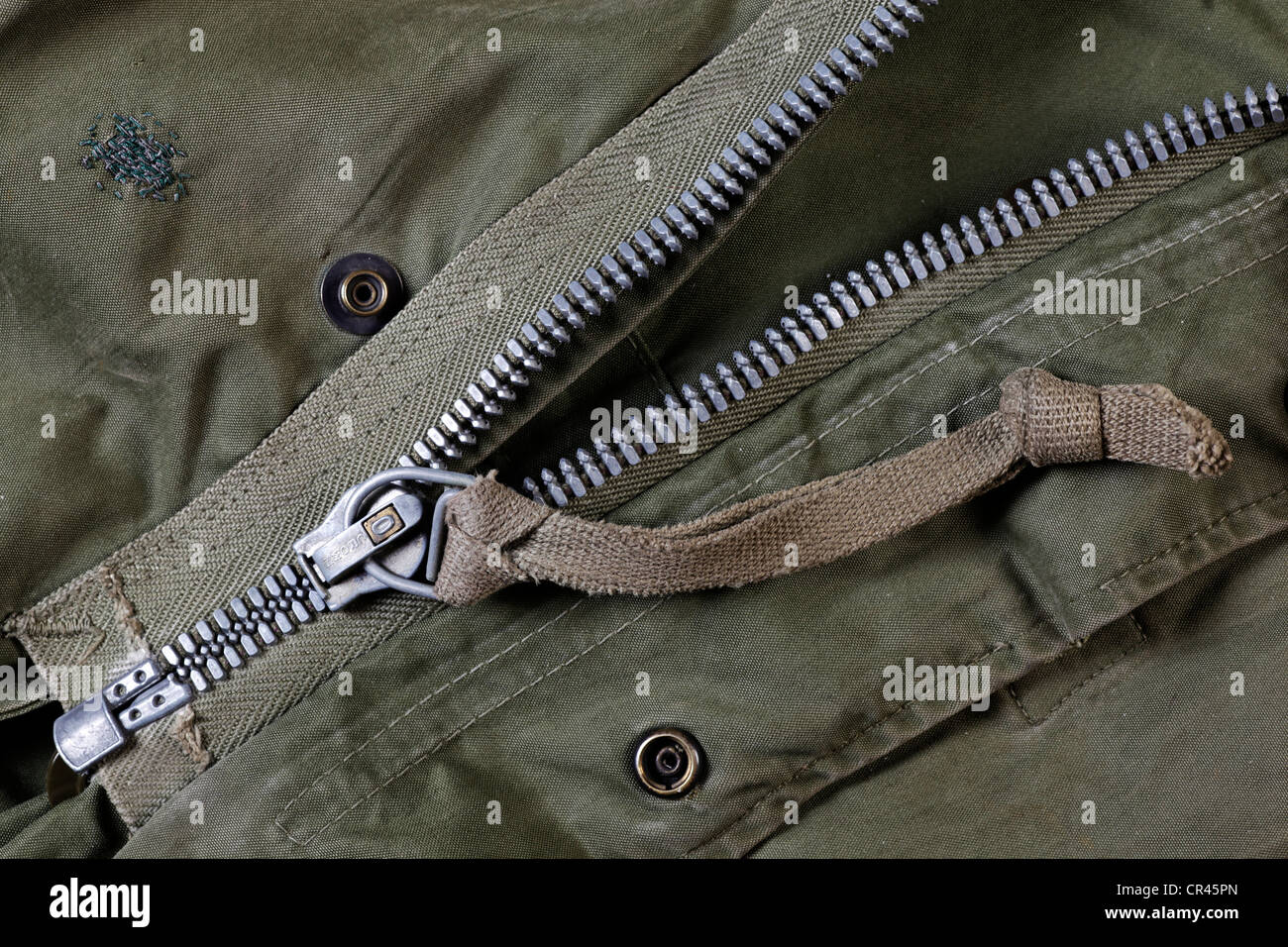 Aluminum zipper from an old U.S. Army parka from circa 1952 Stock Photo