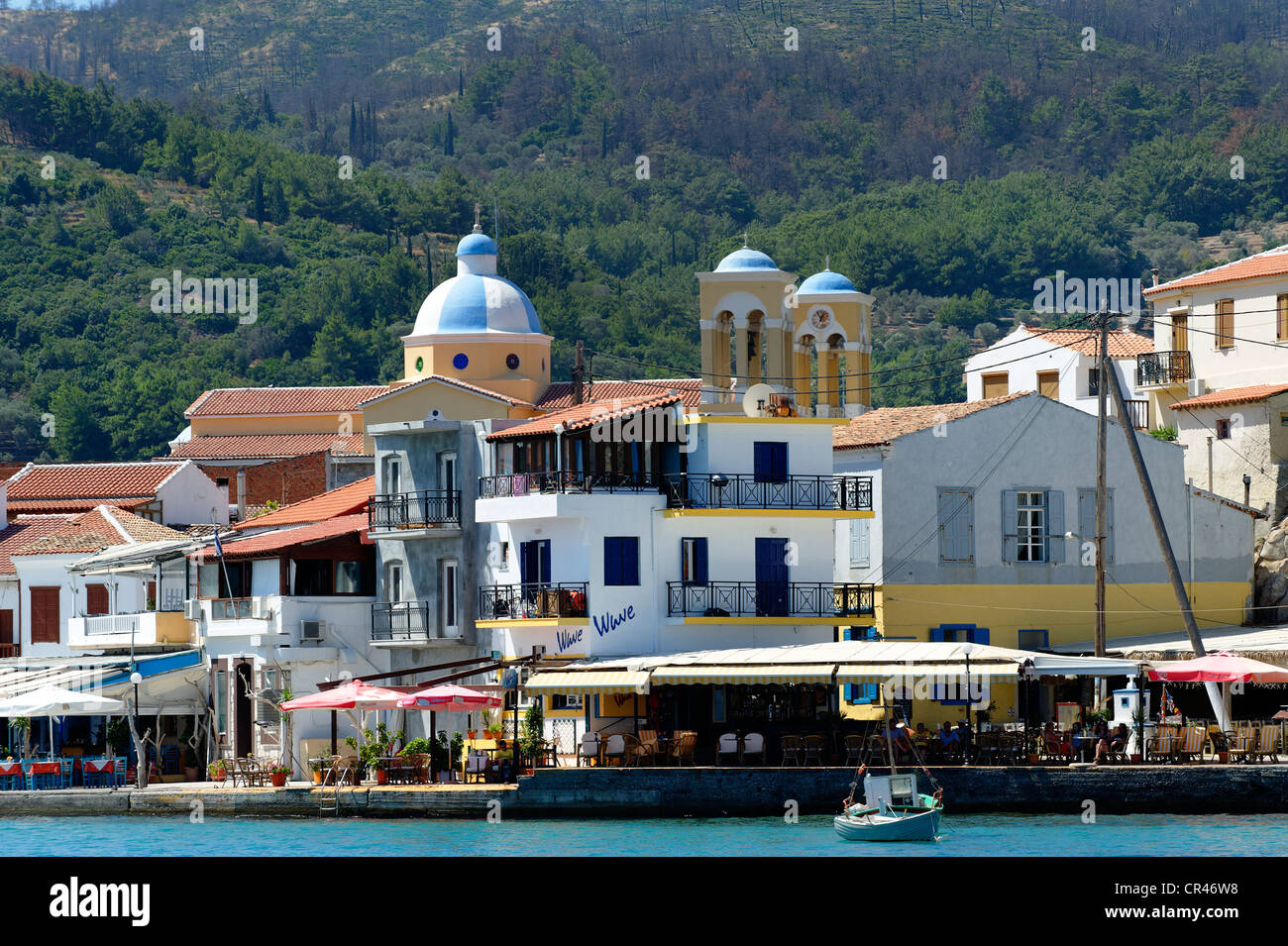 Harbour of Kokkari, with the church of Agios Nikolaos, Samos island, southern Sporades, Aegean sea, Greece, Europe Stock Photo