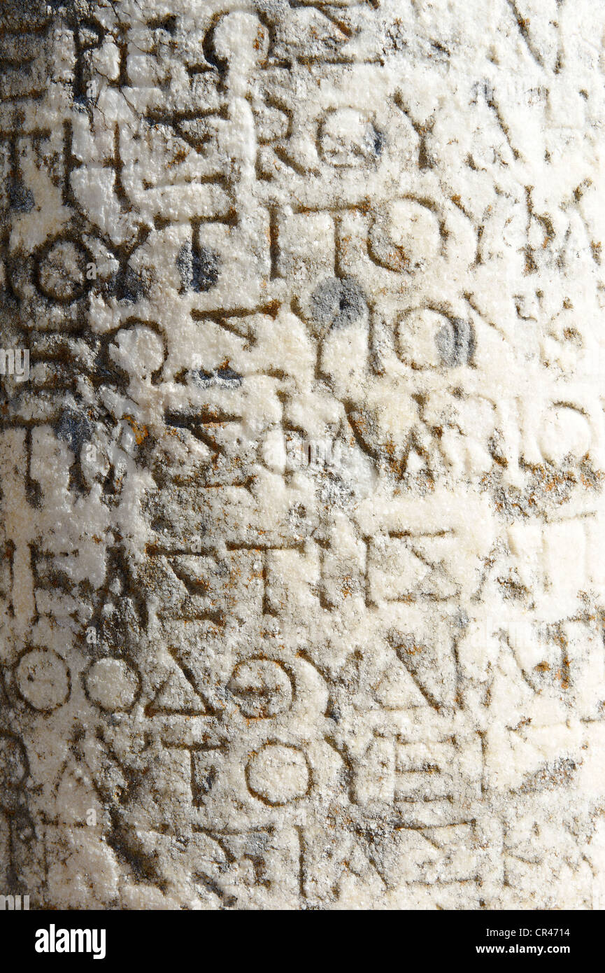 Antic greek inscriptions on a column, excavations of the Heraion or sanctuary to the goddess Hera, UNESCO World Heritage Site Stock Photo