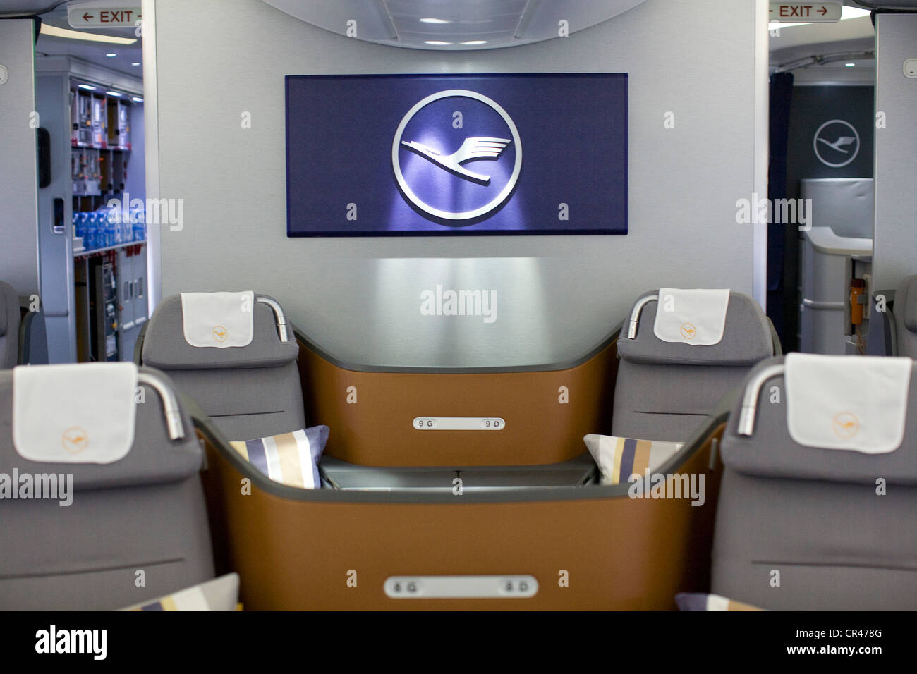 The Business Class section of a Lufthansa Boeing 747-8. Stock Photo