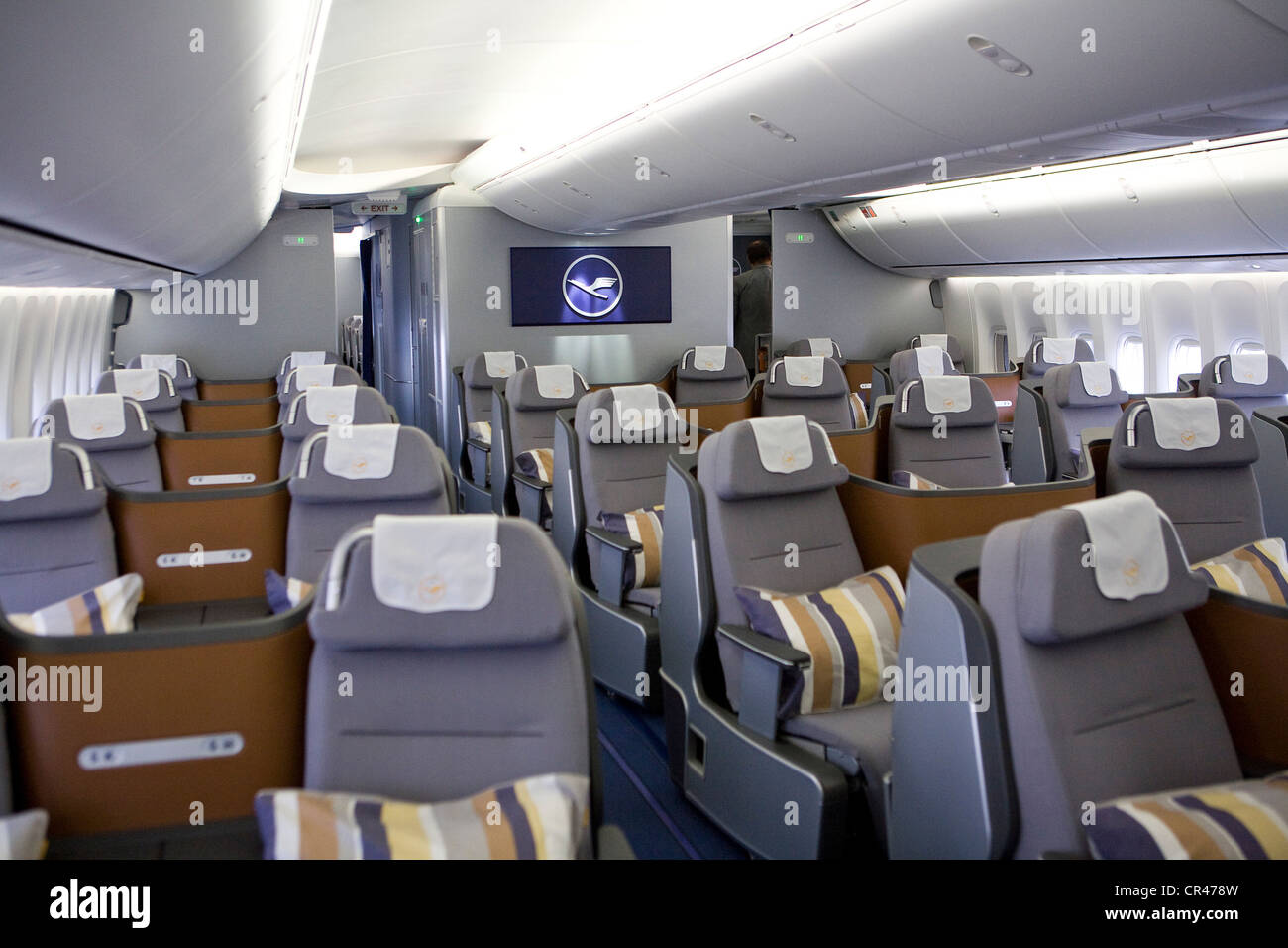 The Business Class section of a Lufthansa Boeing 747-8. Stock Photo