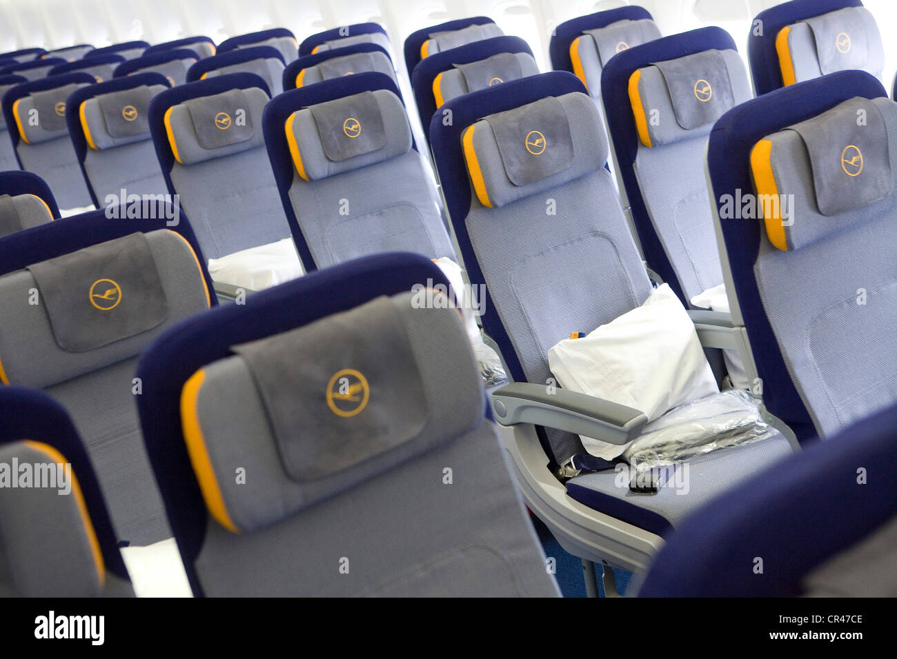 The Economy Class section of a Lufthansa Boeing 747-8. Stock Photo