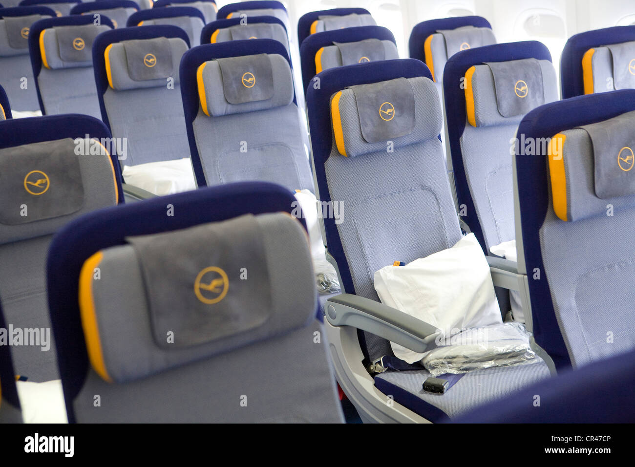 The Economy Class section of a Lufthansa Boeing 747-8. Stock Photo